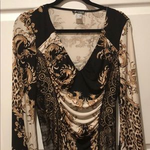 Multi colored dress. Long sleeved.